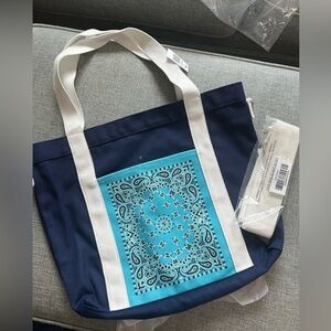 Blue Canvas Tote Bag with an External Pocket and additional crossbody strap